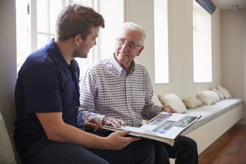 Older man together with a male nurse